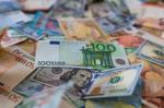 Na zdjęciu banknoty Euro oraz USD ( źródło: CanvaPro)